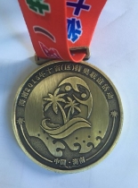 bag hanger and pins and medal 